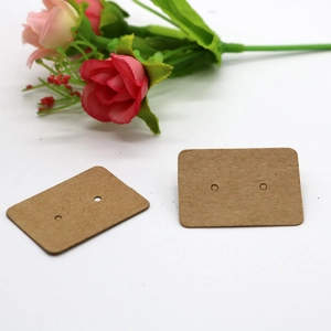 Brown kraft paper earring display card with symmetric holes and pink rose decoration