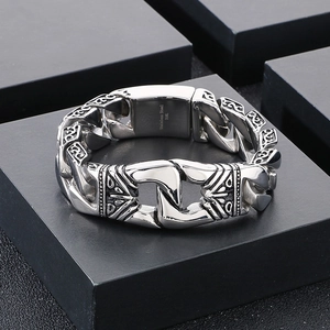 Detailed macro view of 316L stainless steel bracelet with vintage engraved texture