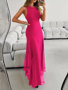 Detail of elegant sleeveless magenta long dress with slit hem and pleats for evening parties