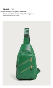 Detail of green litchi grain PU leather sling bag with gold zippers and fabric strap