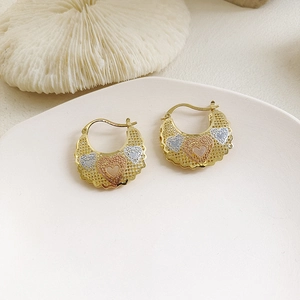 Chic hollow heart-shaped hoop earrings in gold, silver, and rose gold finishes
