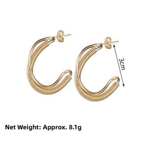 Detailed view of 3cm gold-plated spiral hoop earrings with weight and size markings