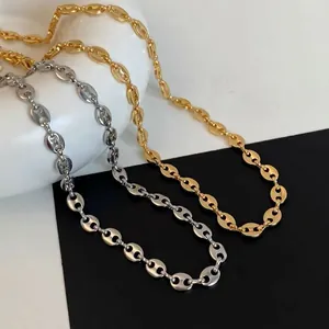 Minimalist gold and silver coffee bean link chain necklace with polished finish