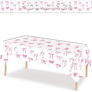 Detail view of 54x108 inch disposable tablecloth with pink bows and gold stars print