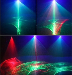 Detail showing red and green laser light beams creating geometric patterns in dark