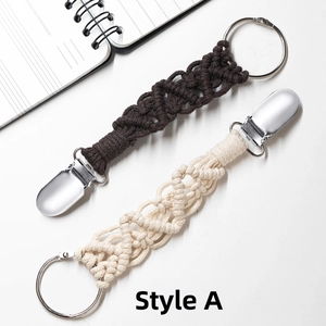 Detail of Style A woven hat clips for travel in dark brown and beige cotton cord