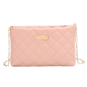 Pink quilted crossbody bag with gold chain strap and elegant metallic nameplate