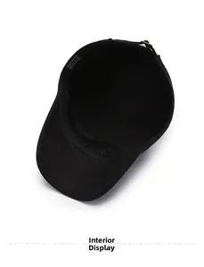 Interior view of black cotton cadet cap showing the lining, stitching, and size label