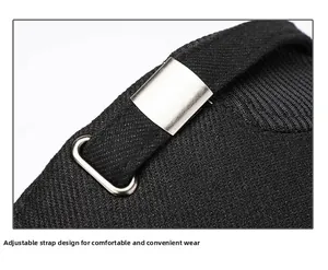 Macro detail of adjustable metal buckle and black twill fabric on a winter baseball cap