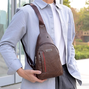 Brown PU leather chest bag for men with adjustable strap and red stripe detail