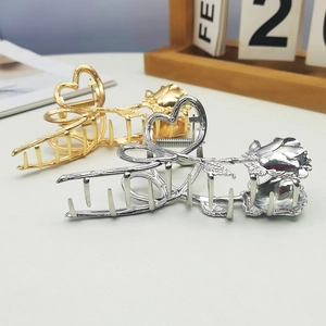 Vintage metal heart and rose hair claw clips in gold and silver finishes