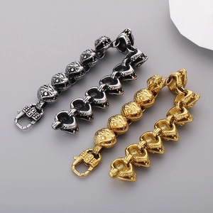 Detailed view of punk style 21mm snake head bracelets in silver and gold stainless steel