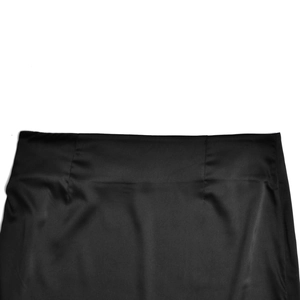 Close-up of black satin skirt waist detail showing smooth texture and stitching