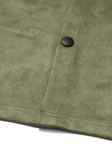 Macro shot of olive green suede fabric detailing with double stitching and a black snap button