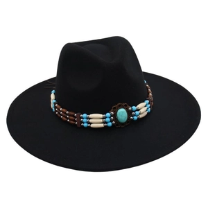 Detail of black wide brim felt hat featuring a bohemian turquoise bead band decoration