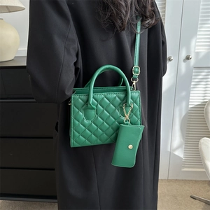 Green quilted faux leather crossbody bag for women with small matching coin purse pouch