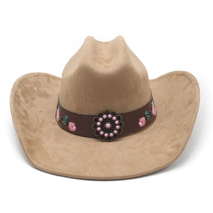 Detail of khaki suede cowboy hat with floral embroidery and antique metal buckle