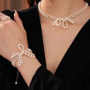 Elegante Schleife Imitation Künstliche Perle Halskette Armband Und Ring Legierung Gewebter Modeschmuck Für Frauen Hochzeit Party