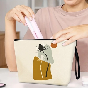 Ink print canvas makeup bag with large capacity, featuring abstract botanical patterns