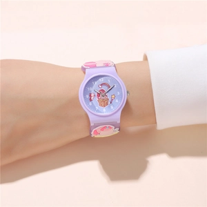 Close-up of purple kids watch featuring 3D cartoon unicorn on a soft silicone strap
