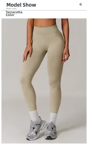 Model wearing high-waisted seamless clay fitness leggings with ribbed knit texture