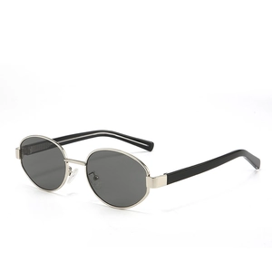 Vintage oval metal sunglasses with silver frames and dark lenses in 45-degree angle view