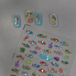 Laser ocean theme nail art stickers featuring colorful fish and coral designs