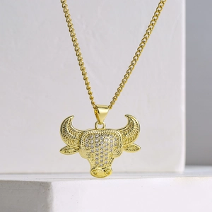 18K gold plated copper bull head pendant necklace with sparkling cubic zirconia stones