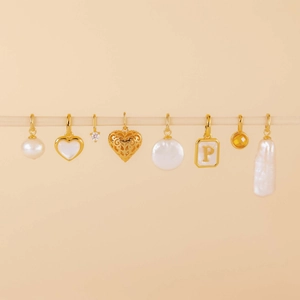 Eight gold plated 18K stainless steel pendants with pearls and heart designs