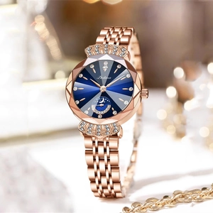 Montre de luxe rose dorée pour femme avec cadran bleu et lunette en cristal