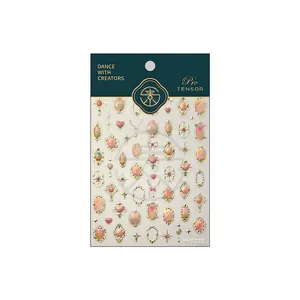 Baroque gemstone nail stickers with gold frame, waterdrop shapes and star accents