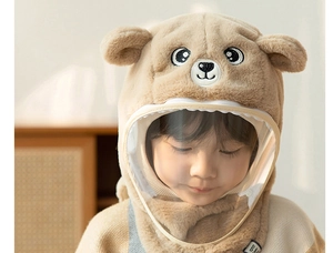 Detail of children's plush hooded hat in khaki with transparent protective face shield
