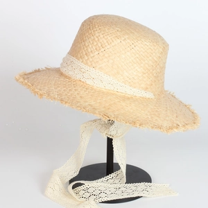 Women's summer raffia sun hat with wide brim, lace trim and elegant bow tie details