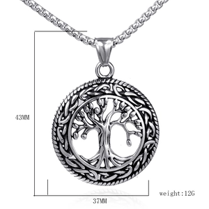 Macro shot of Tree of Life pendant showing dimensions 43mm by 37mm and 12g weight