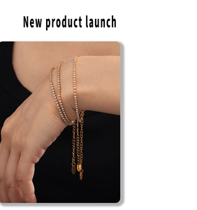 Detailed close-up of gold plated tennis bracelet set with sparkling cubic zirconia stones