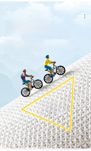 Detail of white triangle matrix anti-slip texture with a cyclist figure on blue background