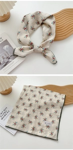 Detail of floral cotton linen square scarf with green crochet lace edge and vintage print
