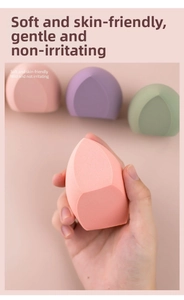 Macro detail of soft water-drop makeup sponges in pastel colors with precise flat cuts