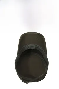 Detail of internal sweatband and adjustable metal buckle on a brown cotton flat top cap