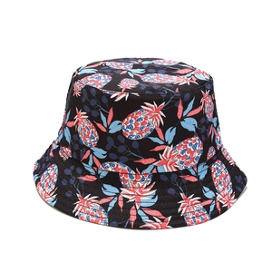 Double-sided bucket hat with colorful pineapple print for outdoor sun protection