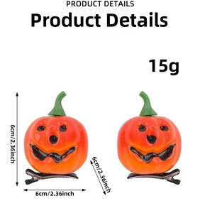 Detail showing 6cm orange Halloween pumpkin hair clip with dimensions and 15g weight