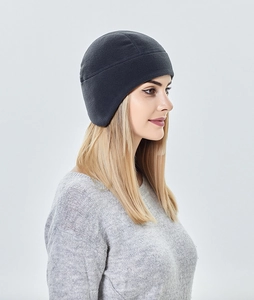 Detail of grey fleece cycling cap showing ear protection and ergonomic fit for winter