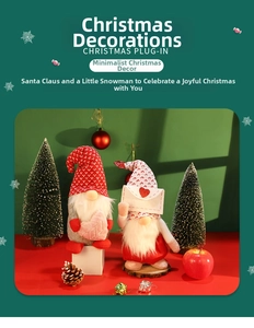 Detailed view of two Christmas gnomes ornaments with heart and letter on festive table