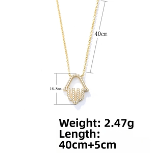 Macro detail of Hamsa Hand pendant measuring 16.8mm with sparkling pavé cubic zirconia