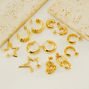 18K gold plated stainless steel earring set featuring hoop and star designs