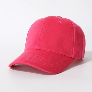 Detail view of pink cotton baseball cap crown with breathable embroidered eyelets