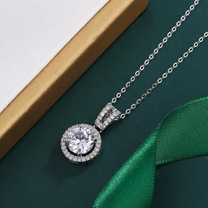 Detailed close-up of a 2-carat zircon pendant with round cut stones on an elegant stand