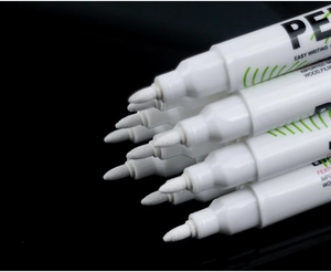 Macro shot of fine fiber tips on white permanent markers for wood and film surfaces