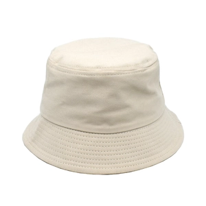 Classic beige cotton bucket hat with a wide brim and stitching for sun protection