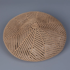 Top-down view of the breathable hollow knit pattern on this khaki summer beret hat